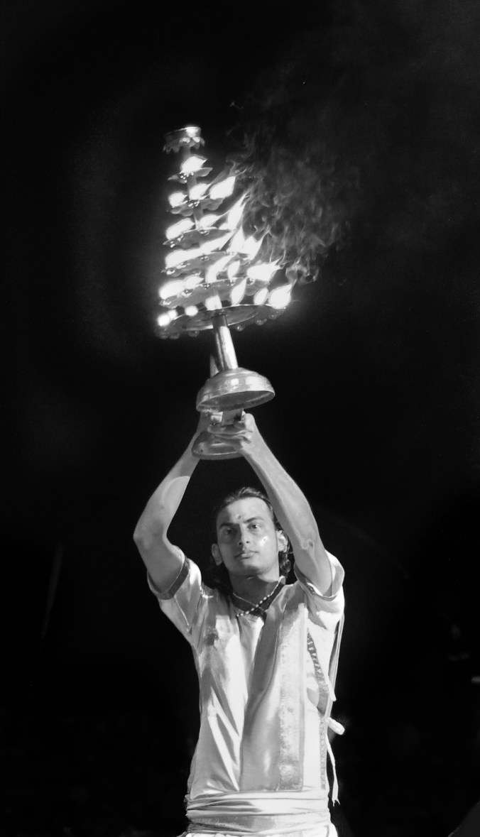 Priest in varanasi at the river ganges