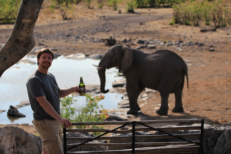 Jeff Drinking Beer in front of Elephant.