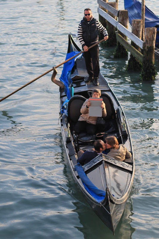 iPad on Gondola with kissing couple