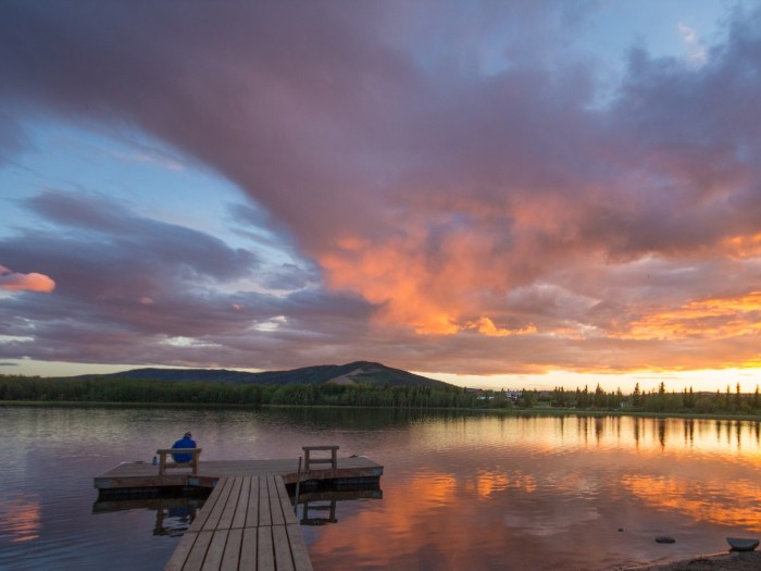 Man watching sunset Otto Lake