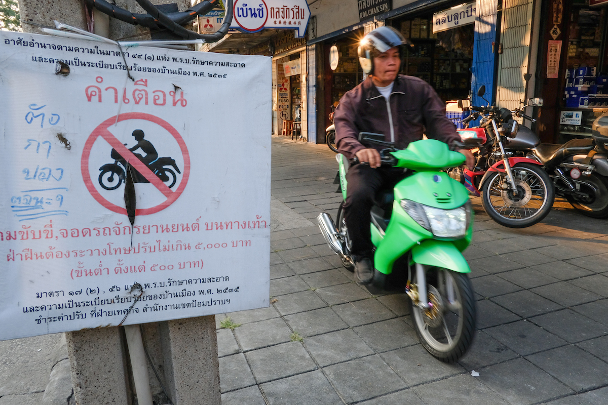 motorbikes on sidewalk Bangkok